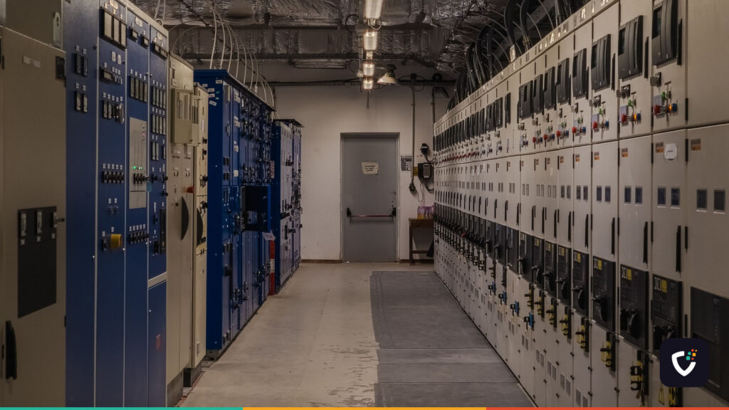 A sophisticated control room filled with electrical panels and equipment for industrial purposes